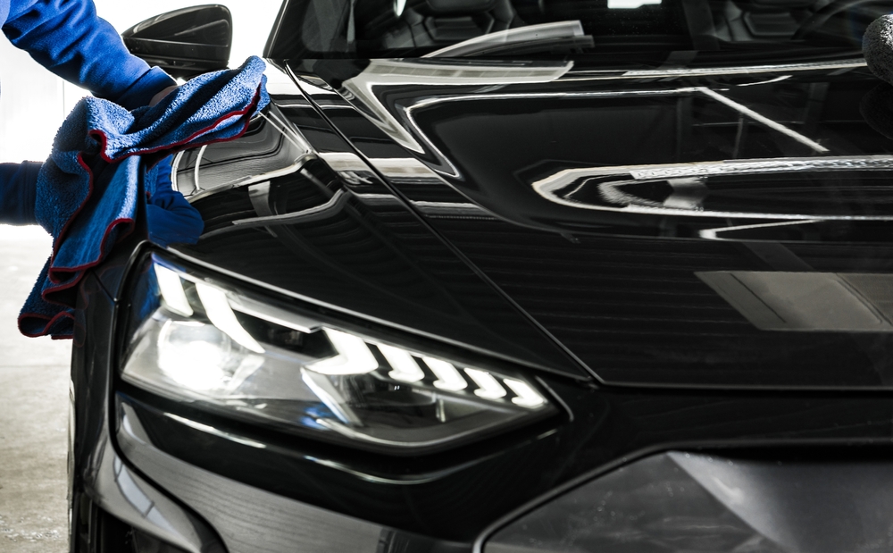 Professional,Car,Wash,And,Detailing,Worker,Cleaning,Car,Body,With
