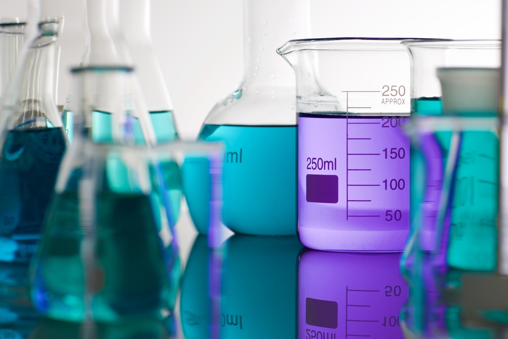 Close,Up,Of,Test-tube,Glass,Beaker,With,Liquid,Standing,On