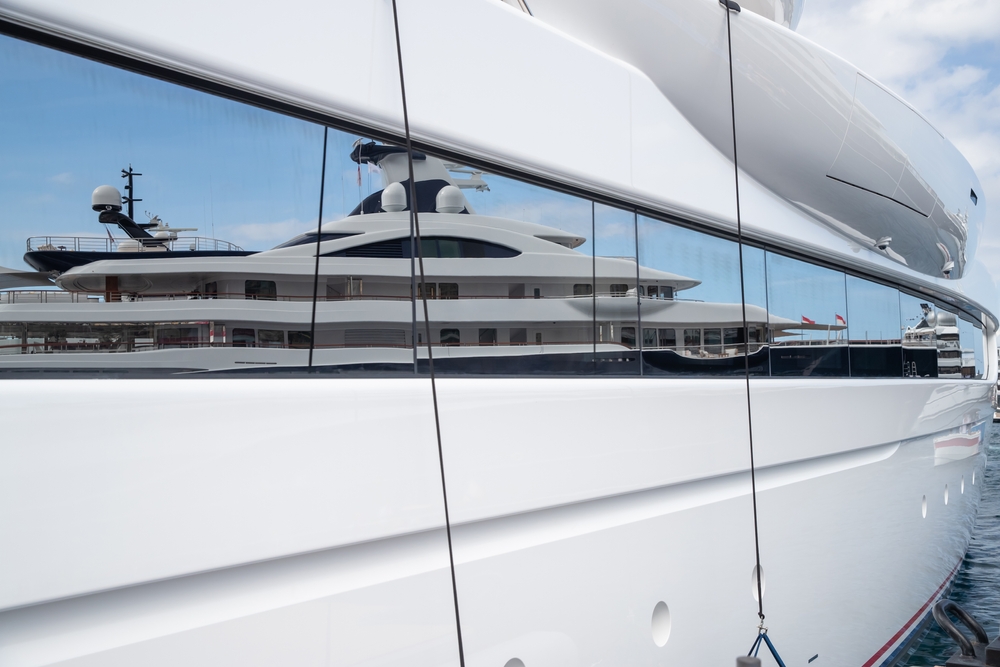 Reflection,Of,A,Boat,On,A,Glossy,Surface,Of,A