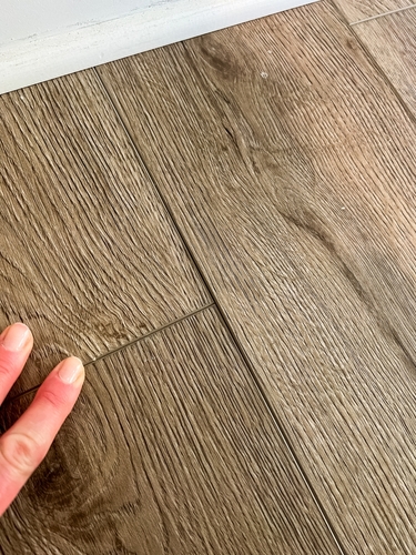 A,Close,Up,View,Of,Vinyl,Plank,Flooring,With,Visible