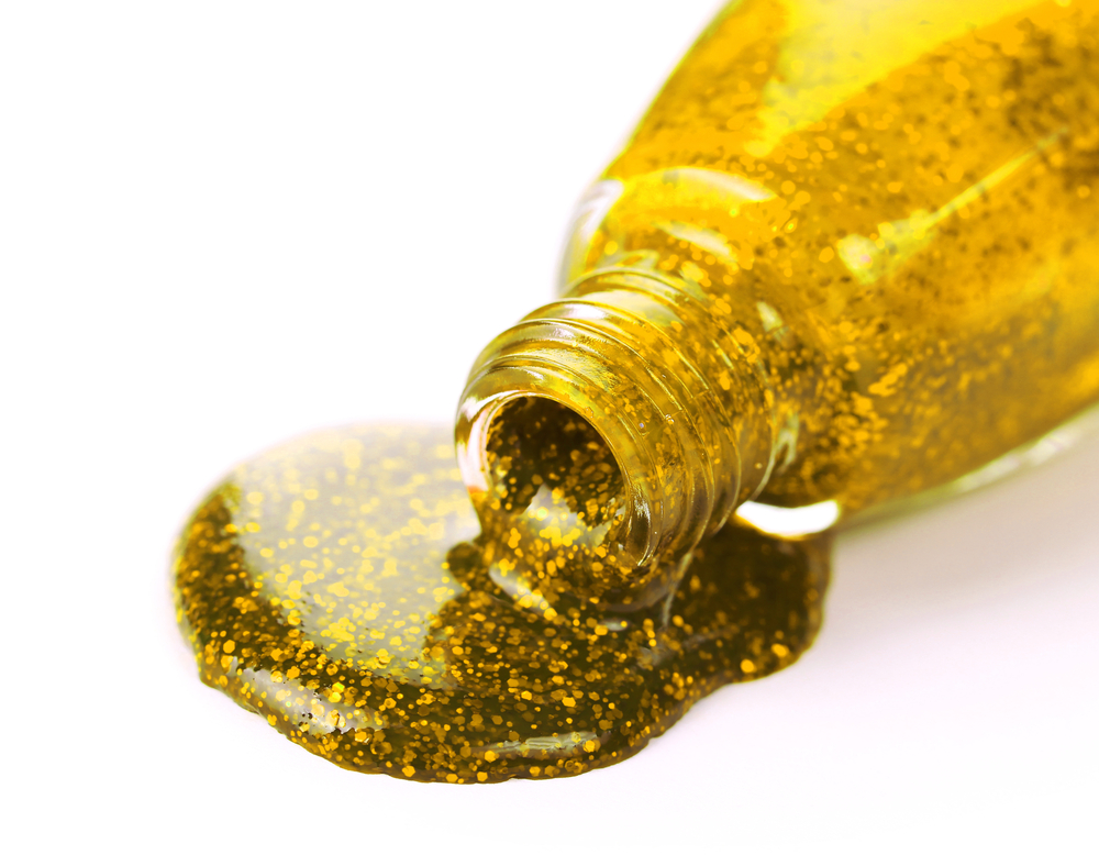 Golden,Nail,Polish,Isolated,On,White